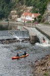 People Canoeing Down The Vlatava River To Krumlov Stock Photo