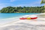Kayaks On The Tropical Beach With Beautiful Sky Stock Photo