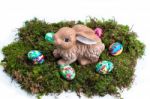 Easter Decoration: Painted Eggs And Rabbit On Moss Stock Photo