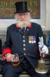 Town Crier Enoying A Pint Of Beer In Southwold Stock Photo