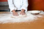 Baker Kneading A Dough Stock Photo