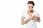 Sick Woman Suffers From Chest Pain Stock Photo