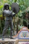 Malaga, Andalucia/spain - July 5 : Statue Of Man Holding A Tambo Stock Photo