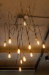 Antique Light Bulbs Hanging On The Ceiling Stock Photo