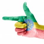 Ethiopia Flag On Shooting Hand Stock Photo