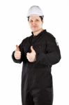 Handyman Wearing Uniform And Hardhat Stock Photo