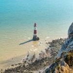 Beachey Head, Sussex/uk - July 23 : View Of The Lighthouse At Be Stock Photo