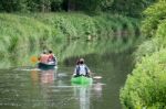 Canoeing On The Kennet And Avon Canal Near Aldermaston Berkshire Stock Photo