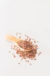 Yellow Flax Seed On Clean Kitchen Table Stock Photo