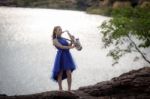 Beautiful Woman Wear Blue Evening Dress Sound Saxophone Stand On Stock Photo