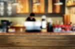 Selected Focus Empty Brown Wooden Table And Coffee Shop Or Resta Stock Photo