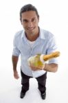 Young Handsome Guy Holding Wine Bottle Stock Photo