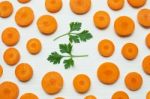 Chopped Carrot Slices With Parsley Leaves Stock Photo