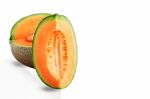 Melon Cut On White Background Stock Photo