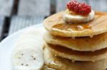 Stack Of Delicious Pancakes With Fresh Fruits Stock Photo