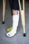 Injured Person With Crutches Stock Photo