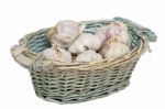 Wicker Basket Full Of Garlic Heads Stock Photo