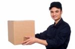 Young Boy Delivering Parcel Stock Photo