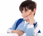 Adorable School Boy Thinking Stock Photo