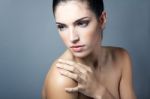 Beautiful Face Of Young Adult Woman With Clean Fresh Skin Stock Photo