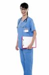 Duty Doctor Posing With Case Sheet In Hand Stock Photo