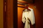 Close Up Of Clothes Hanger And Twins Bathrobe Stock Photo