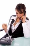 Front View Of Angry Executive Interacting On Phone Stock Photo