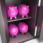 Open Safe With Piggy Showing Safe Savings Stock Photo
