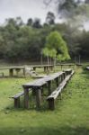 Outdoor Wooden Furniture In Field Stock Photo