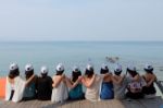 Women Friends Sit Hug Together Blue Sea Sky Stock Photo