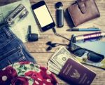 Set Of Travel Accessory On Wooden Table Stock Photo