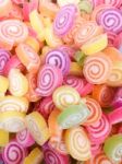 Colorful Jelly Candy Bonbon Snack Group. Sweet For Valentines Day Background. Pastel Color In Green Yellow Pink Purple Orange Stock Photo