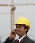 Engineer Talking Over Phone Stock Photo