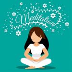 Woman Meditating With Flowers Stock Photo