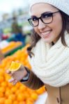 Young Beautiful Woman Shopping Fruit In A Market Stock Photo
