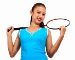 Sporty Girl Holding A Badminton Racket Stock Photo