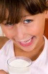 Smiling Girl With The Milk Glass Stock Photo