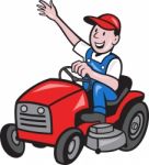 Farmer Driving Ride On Mower Tractor Stock Photo