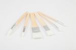 White Paintbrushes With Wooden Handle Stock Photo