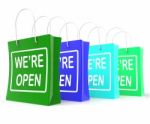 We're Open Shopping Bags Shows New Store Launch Stock Photo
