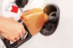 Hands Of Fueling Cars Stock Photo