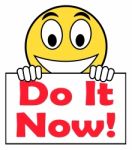 Do It Now On Sign Shows Act Immediately Stock Photo
