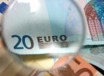 Inspecting Twenty Euro Bill Stock Photo