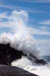 Massive Wave Hitting The Rocky Shore In Tenerife Stock Photo