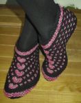Hand Knitted Female Slippers Stock Photo