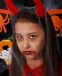 Girl Dressed Up As Devil Stock Photo