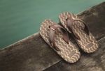 Sandals On Wood Stock Photo