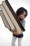 Girl Showing Books Stock Photo