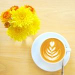 Latte Or Cappuccino Coffee With Flower Stock Photo