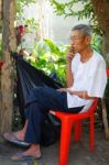 Old Man Smoking Stock Photo